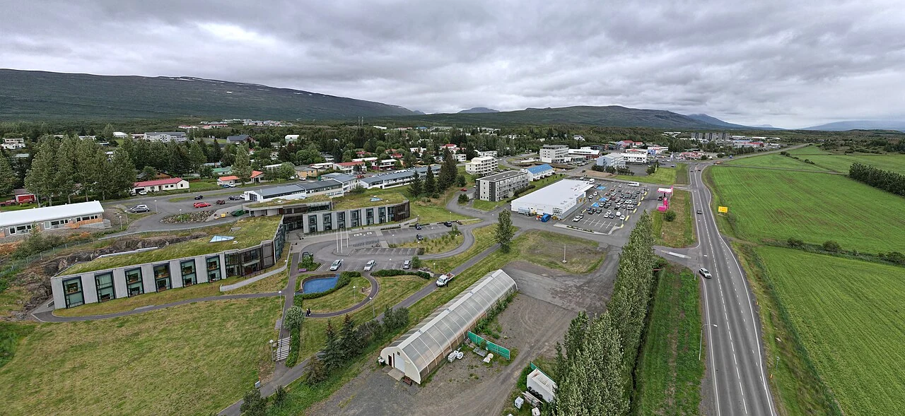 An aerial view of Egilsstaðir roads, buildings and green space