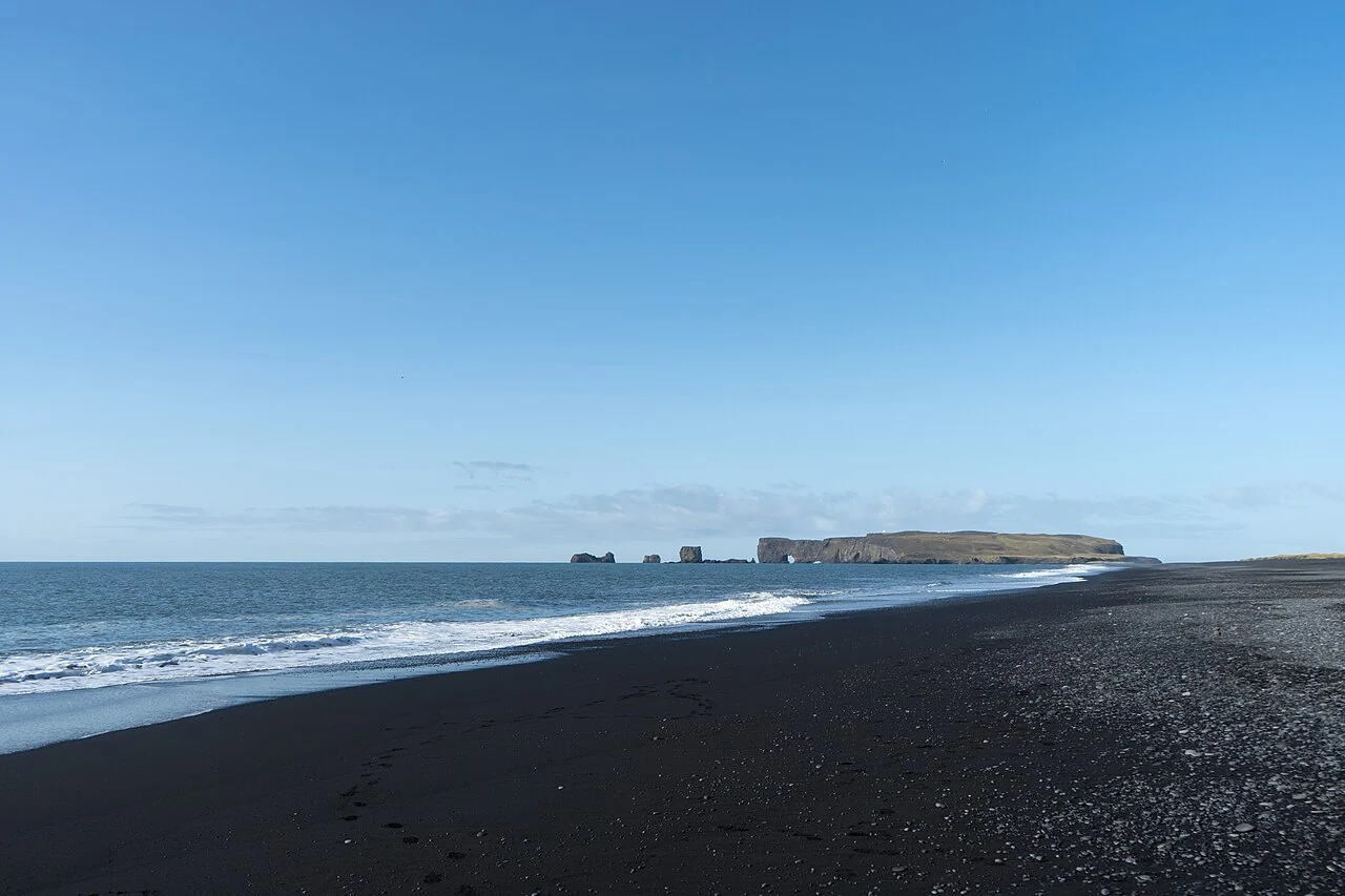 Black-sand shore and Atlantic waves near Vík